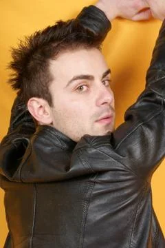 Young man with leather jacket Stock Photos