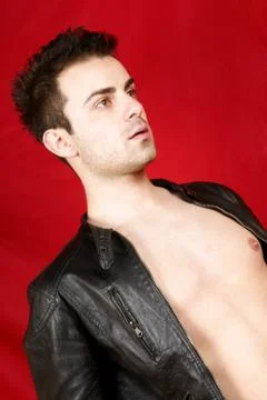 Young man with leather jacket Stock Photos