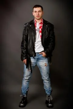 Young man in a leather jacket Stock Photos