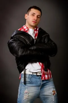 Young man in a leather jacket Stock Photos