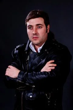 Young man in a leather jacket Stock Photos