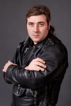 Young man in a leather jacket Stock Photos