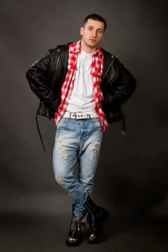 Young man in a leather jacket Stock Photos