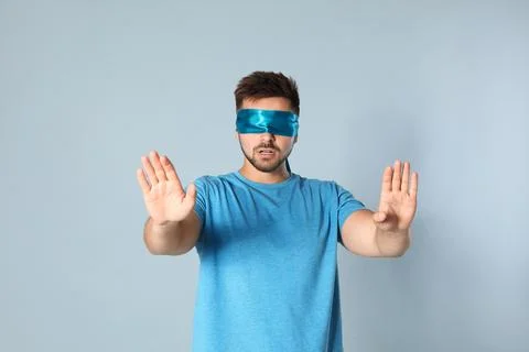 Blindfolded Man Stock Photos and Images - 123RF