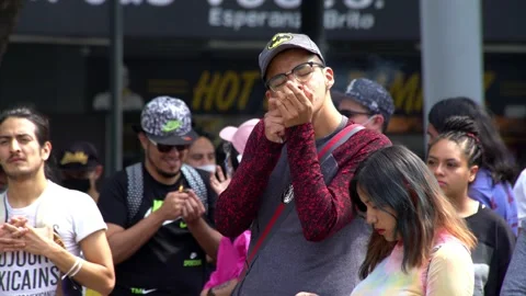 Young man lights a joint of weed and smokes it Stock Footage 139468663