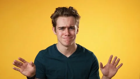 Young man look at camera pointing fingers himself ask say who me no thanks i do Video stock 221840991