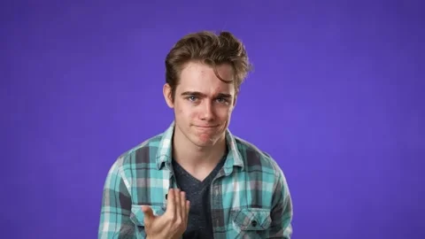 Young man look at camera pointing fingers himself ask say who me no thanks i do Stock Footage 221875274