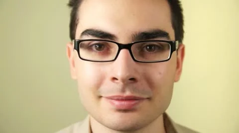 Young man looking at camera - Full HD Stock Footage