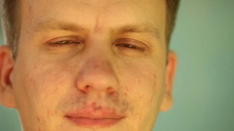 Young man is looking at the camera. on open air Stock Footage 78206220