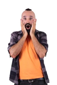 Young man looking at camera surprised or frightened Stock Photos