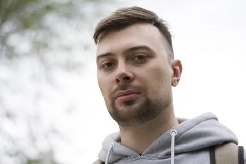Young man looking directly at the camera Stock Photos