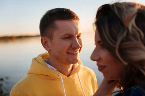 Young man looking at his partner with love Stock Photos