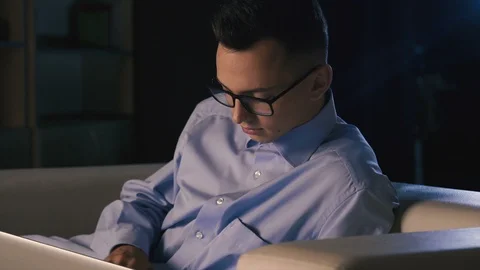 A young man is looking for information on the Internet Stock Footage 98305832