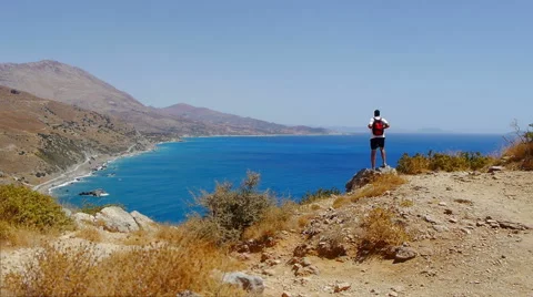 Young Man Looking at Sea from the Cliff Stock Footage 45186130