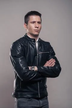 Young man, looking sideways, looking tense, leather jacket, 스톡 사진
