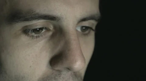 Young man looking at a tablet or laptop Stock Footage 57702291