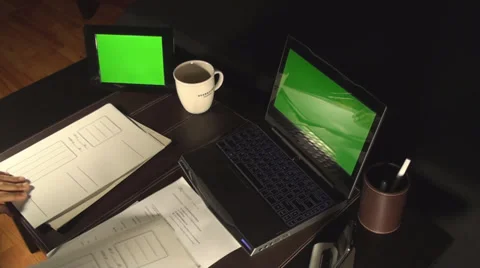 Young Man Looking Through Files Photo Frame And Laptop Greenscreen Office,Hours, Stock Footage 35770765