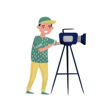 Young man looking through video camera on tripod. Cameraman making movie with イラスト素材