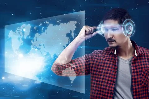 Young man looking world map with futuristic smart high tech glasses Stock Photos