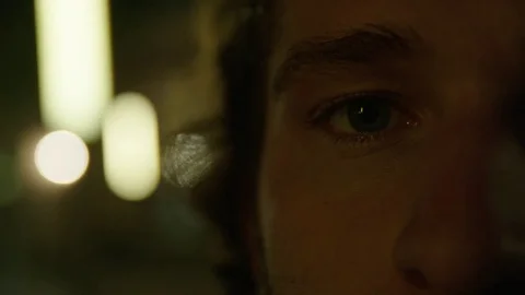 Young Man Looks into Camera Stock Footage 77207671