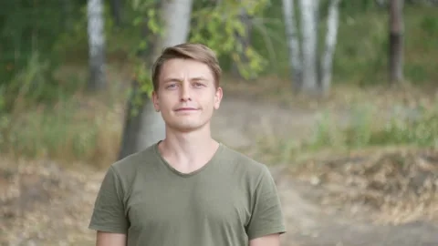 The young man looks at the camera 動画素材 138684661