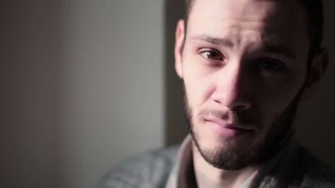 Young Man Looks At Camera, Smiling Close up Stock-Footage 72369519