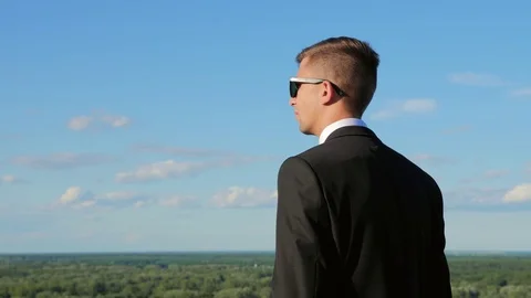 A Young Man Looks Into the Distance Stock Footage 77435567