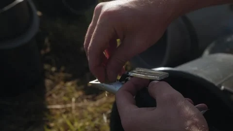 A young man looks into a refractometer. Stock Footage 262255960