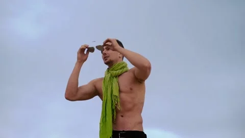 Young man looks at the sky after the rain Video stock 90653029
