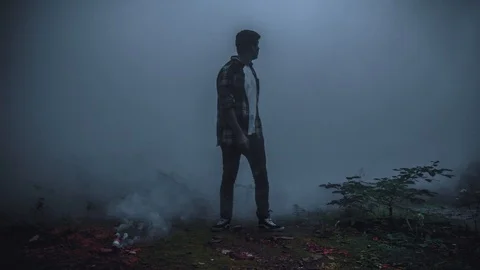 Young Man Lost In The Smoke Stock Footage 106537038