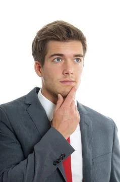 Young man lost in thought Stock Photos