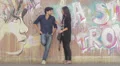 a young man in love makes a pass with a beautiful woman - flirt - cell phone HD Footage