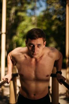 Young man make push-up. Stock Photos
