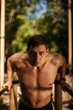 Young man make push-up. Stock Photos