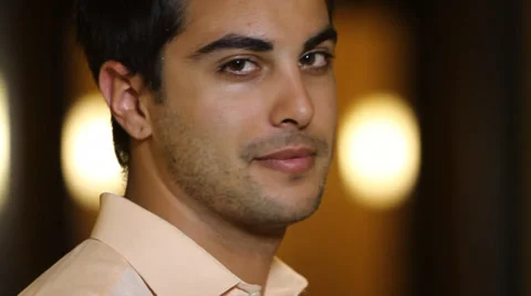 Young man makes Call-me hand gesture Stock Footage 38763598