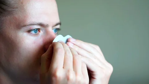 Young man makes cleaning mask on nose isolated Stock Footage 112993278