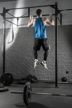 Young man makes pull-up workout Stock-Fotos