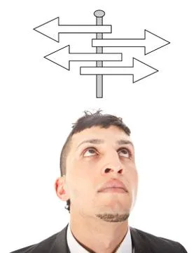 Young man making a choice with arrows isolated on white background Stock Photos