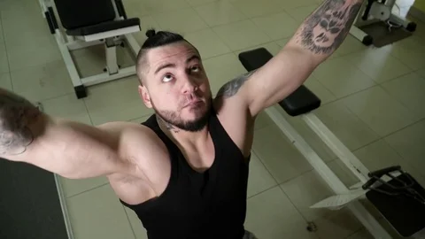 Young man making lat pull-down exercise in the gym closeup Stock Footage 74135525