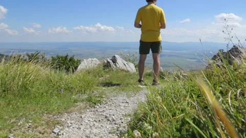 Young man making selfie on mountain Stock Footage 96217382