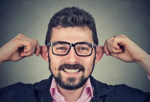 Young man making silly faces Stock Photos