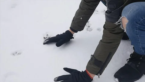 Young Man Making a Snowballs Video stock 85526799