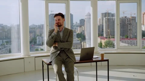 Young man manager worker boss specialist professional businessman sitting on Stock Footage 247319191