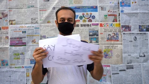 Young Man with mask saying no to corona Stock Footage 127052147