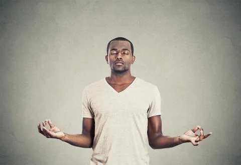 Young man meditating Stock Photos