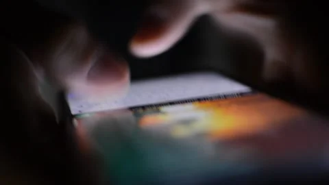 Young man message with phone. iphone typing night. phone communication. 库存影片 217439234