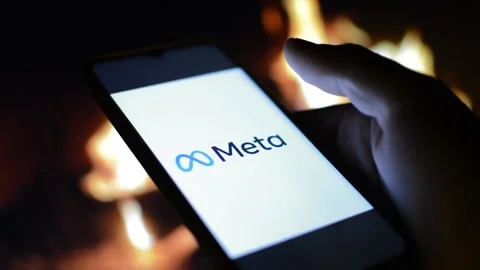 Young man with meta by facebook logo on his phone. cyberspace network Stock Footage 175211550