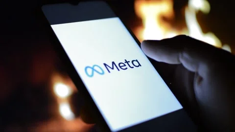 Young man with meta by facebook logo on his phone. cyberspace network Stock Footage 175211591