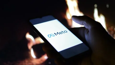 Young man with meta by facebook logo on his phone. cyberspace network Stock Footage 175211597
