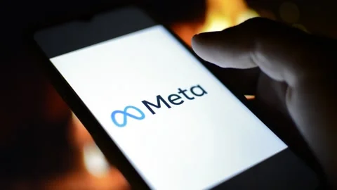 Young man with meta by facebook logo on his phone. cyberspace network Stock Footage 175211629